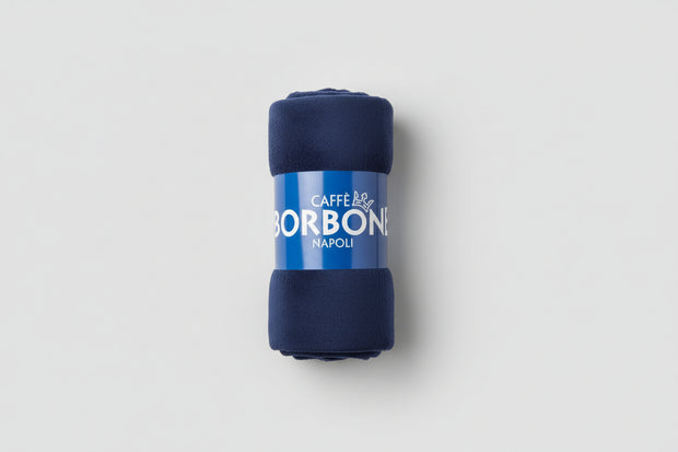 Borbone plaid blanket from Capsule Caffè & Dolci featuring a cozy, checkered design in warm tones, perfect for comfort and style.