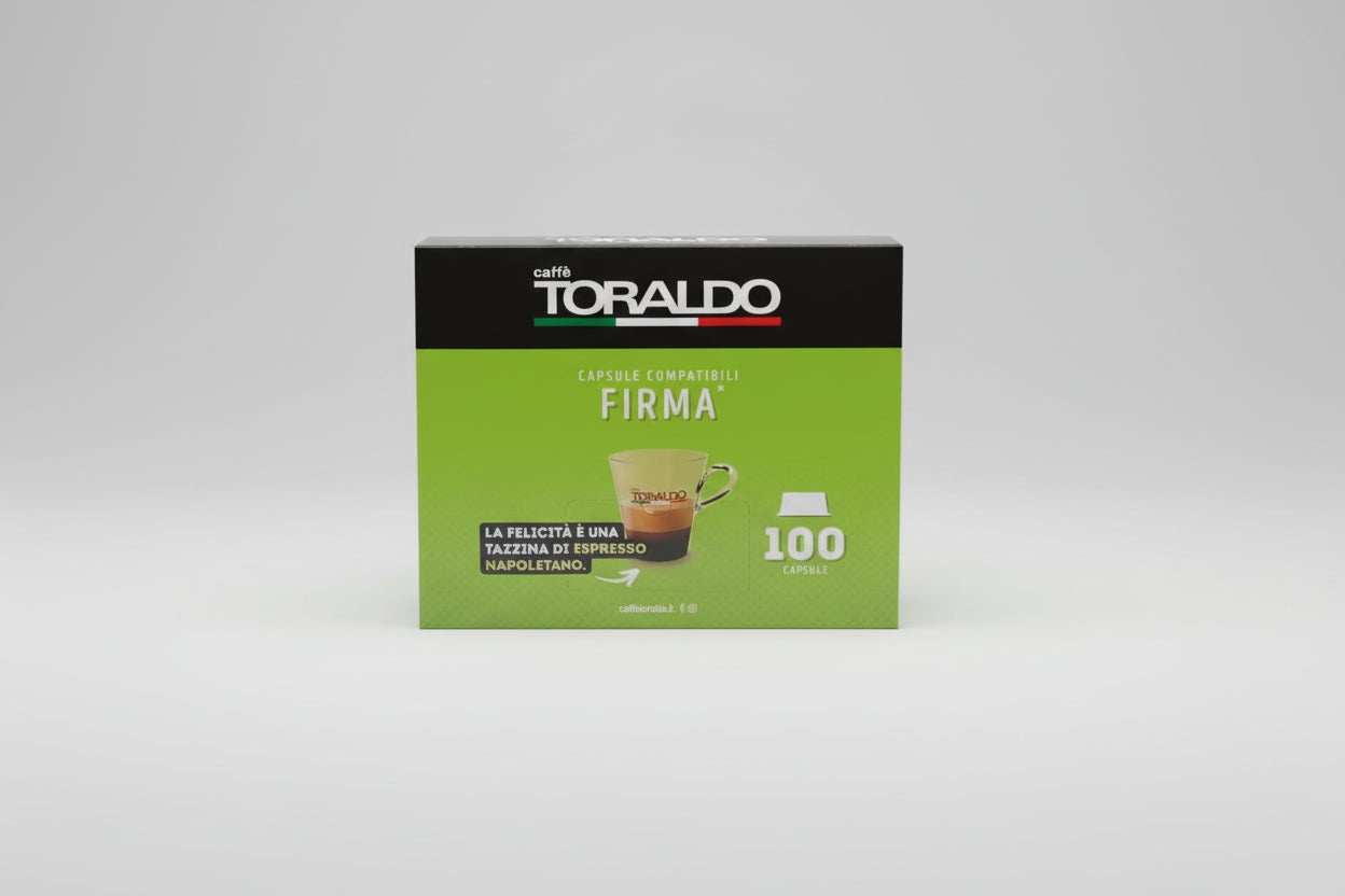 Toraldo Lavazza Firma Cremosa 100 capsule coffee pack by Capsule Caffè & Dolci, showing a row of coffee capsules in a box.