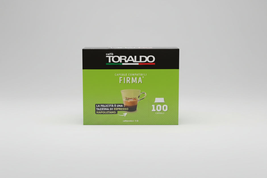 Toraldo Lavazza Firma Cremosa 100 capsule coffee pack by Capsule Caffè & Dolci, showing a row of coffee capsules in a box.
